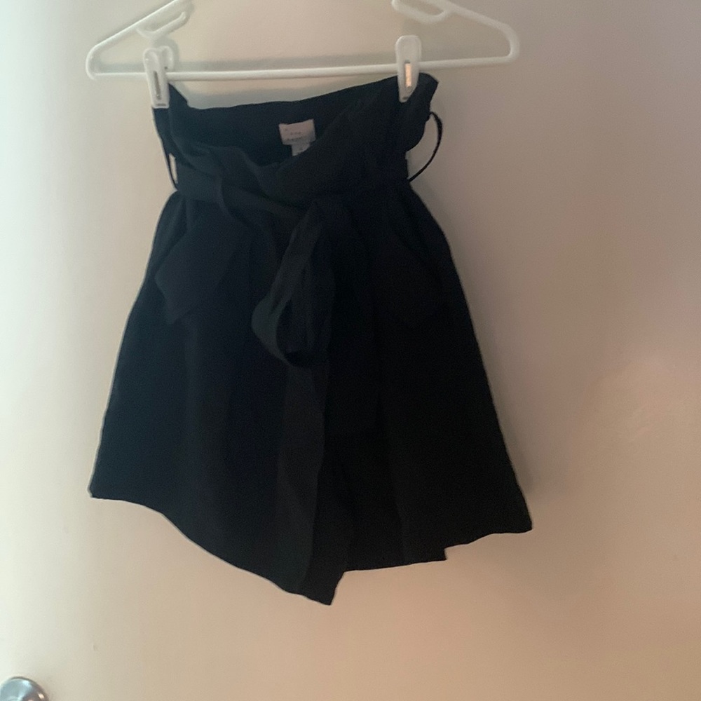 Size 6 cute black belted shorts. Never worn
